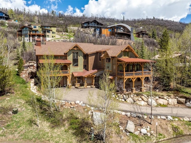 view of front of home with a balcony