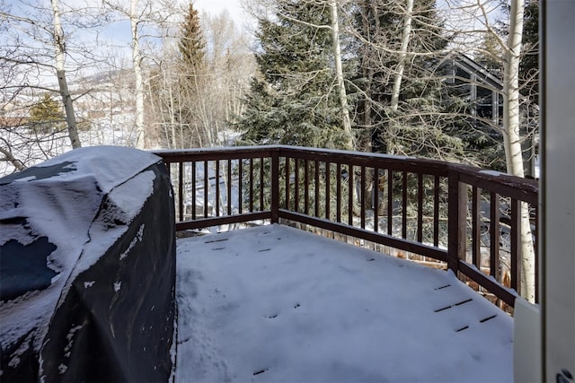 view of snow covered deck