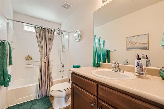 full bathroom with shower / tub combo with curtain, vanity, and toilet