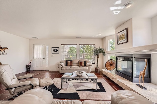 tiled living room with a fireplace