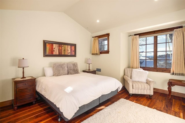 bedroom with dark hardwood / wood-style floors and vaulted ceiling