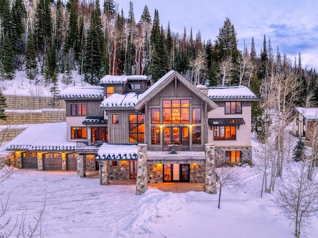 view of snow covered house