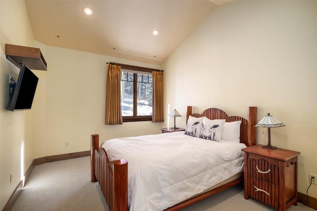 carpeted bedroom featuring vaulted ceiling