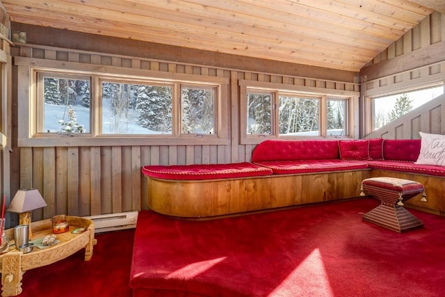 sunroom / solarium featuring lofted ceiling, a baseboard heating unit, and wood ceiling