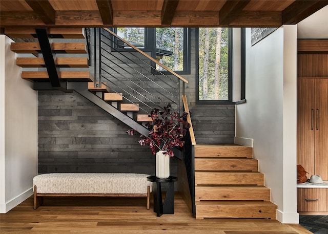 stairway featuring wood-type flooring