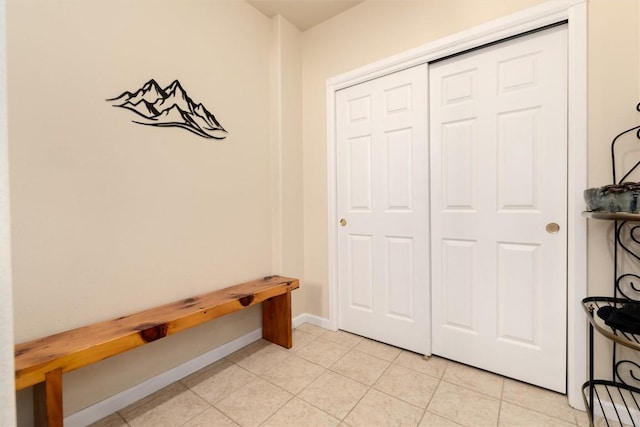 mudroom with light tile patterned floors