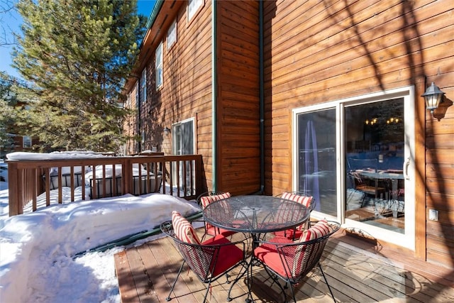 view of snow covered deck