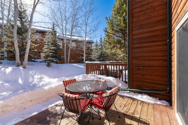 view of snow covered deck