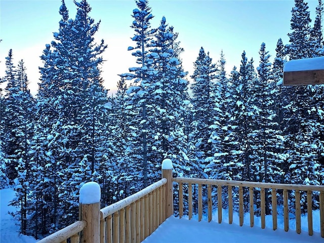 view of snow covered deck