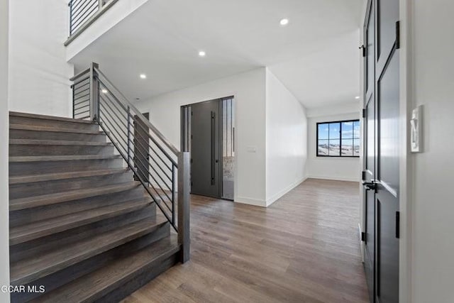 entrance foyer featuring dark hardwood / wood-style flooring