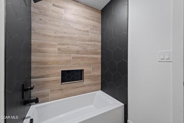 bathroom with shower / bathing tub combination