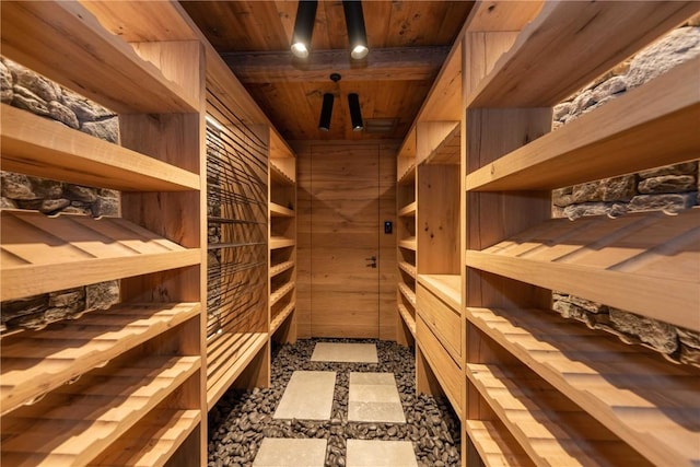 wine cellar with wood ceiling