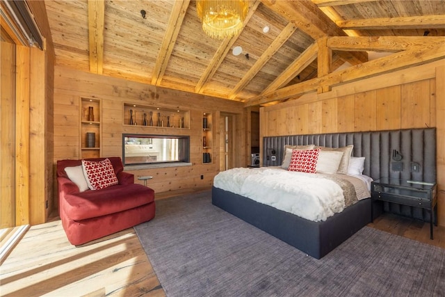 bedroom with wood ceiling, wooden walls, high vaulted ceiling, beamed ceiling, and dark hardwood / wood-style floors