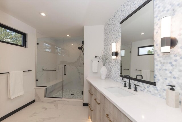 bathroom with vanity and an enclosed shower