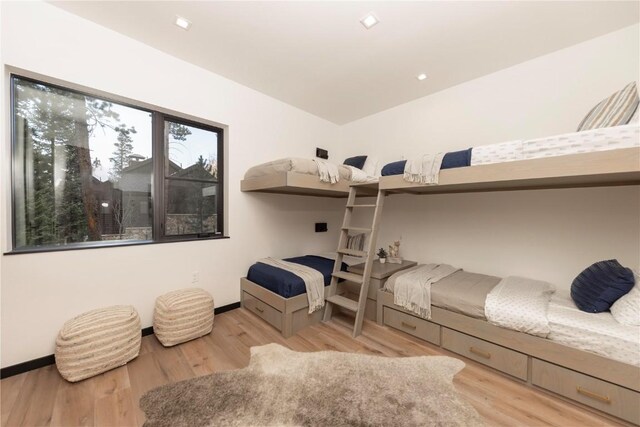 bedroom with light hardwood / wood-style flooring