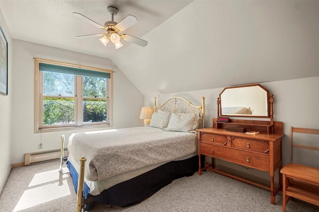 bedroom with ceiling fan, light colored carpet, baseboard heating, and vaulted ceiling