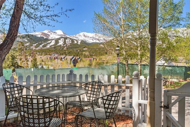 view of patio / terrace with a mountain view