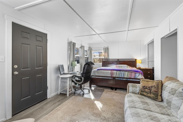 bedroom with light hardwood / wood-style flooring