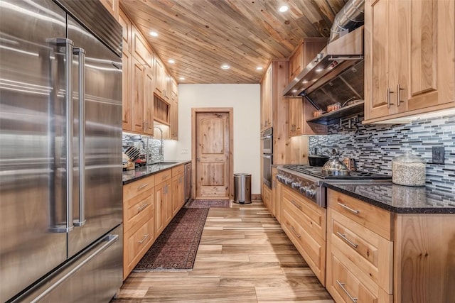 kitchen with ventilation hood, backsplash, dark stone counters, stainless steel appliances, and wooden ceiling