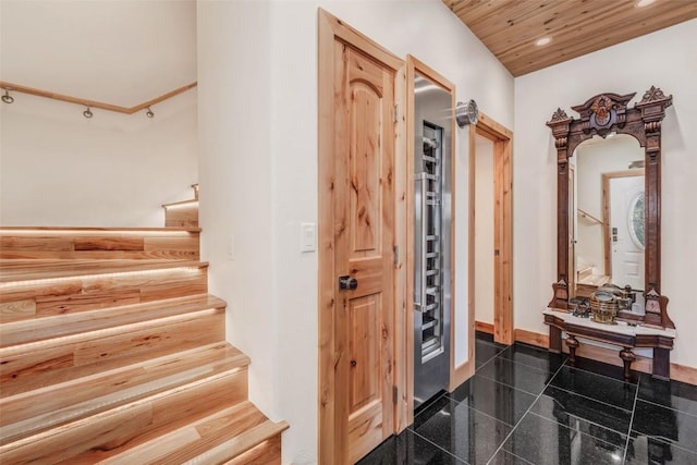 entrance foyer featuring wooden ceiling