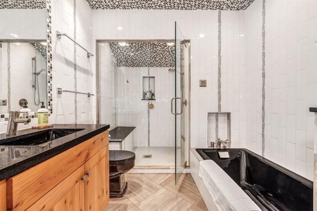 full bathroom with tile walls, vanity, plus walk in shower, parquet floors, and toilet