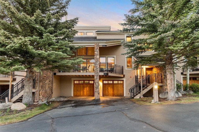 view of front of property with a garage