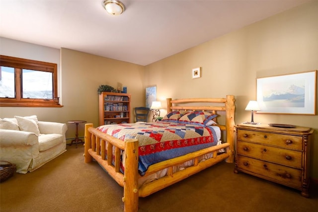 bedroom featuring dark colored carpet