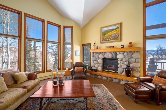 carpeted living room featuring a fireplace, a high ceiling, and baseboard heating