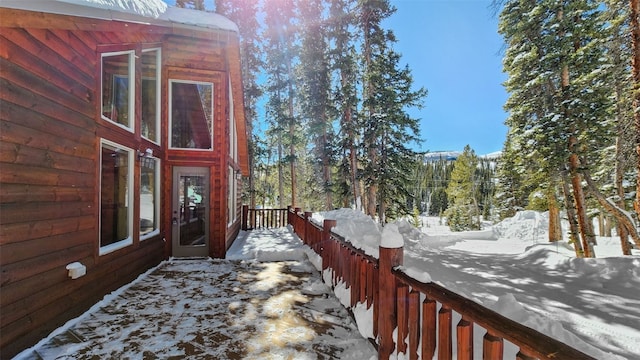 view of yard layered in snow