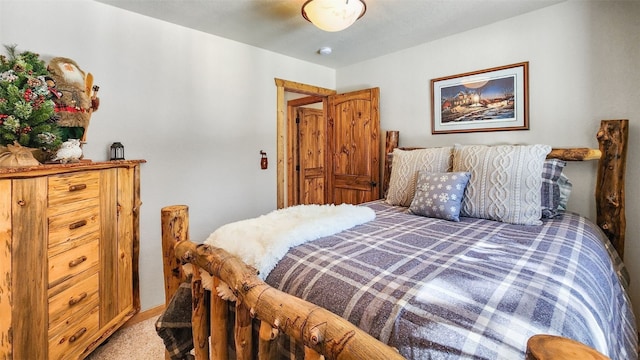 bedroom with light colored carpet