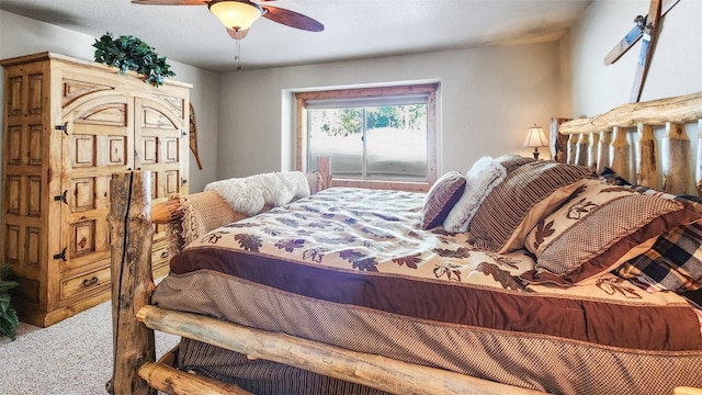 carpeted bedroom featuring a ceiling fan