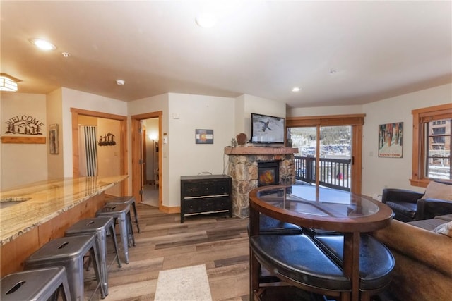 interior space featuring a fireplace and light hardwood / wood-style floors