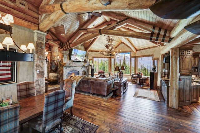 living room featuring an inviting chandelier, a fireplace, wood ceiling, dark wood-type flooring, and beam ceiling