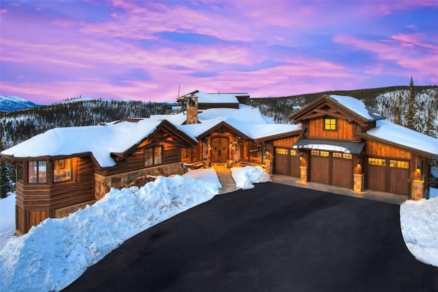 log cabin with a garage