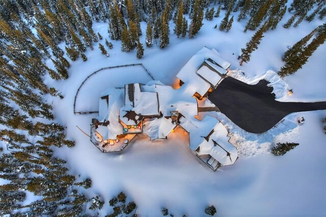 view of snow covered property entrance