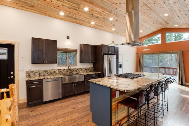 kitchen featuring sink, stainless steel appliances, island exhaust hood, a kitchen island, and wood ceiling