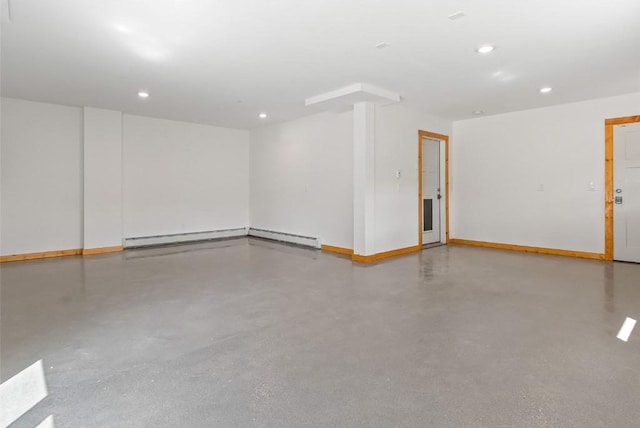 garage with a baseboard heating unit