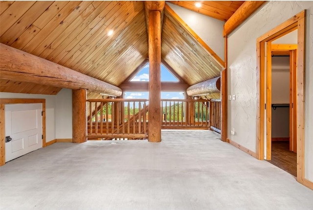 additional living space featuring light carpet, lofted ceiling with beams, and wood ceiling