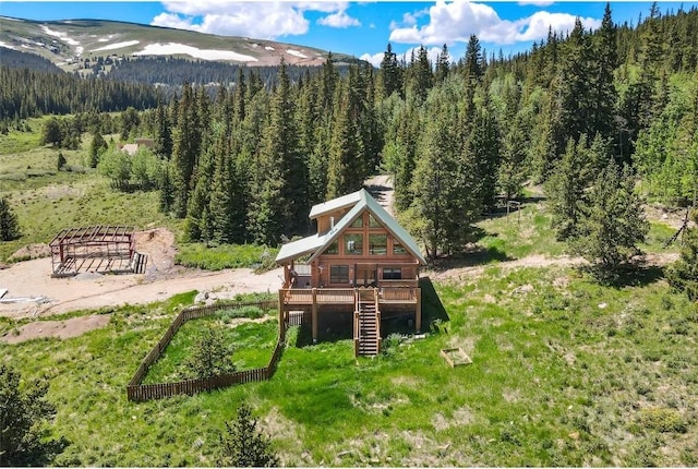 birds eye view of property featuring a mountain view