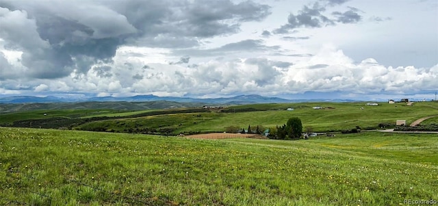 view of mountain feature featuring a rural view