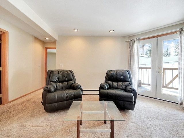 living room featuring french doors, carpet floors, and baseboard heating