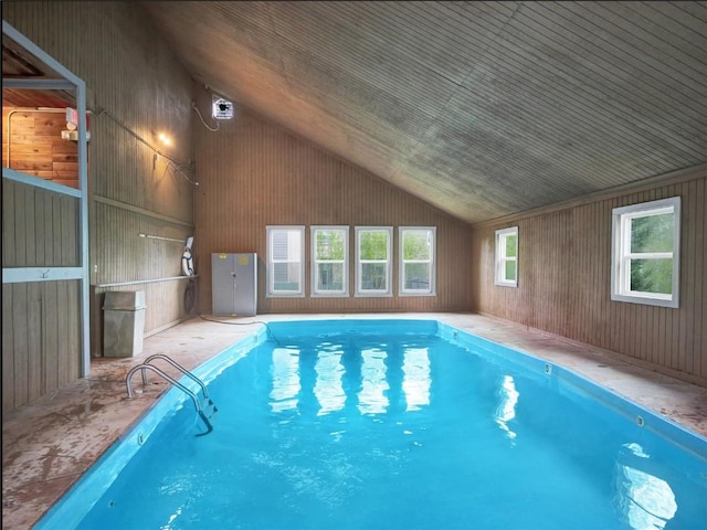 view of swimming pool with a jacuzzi