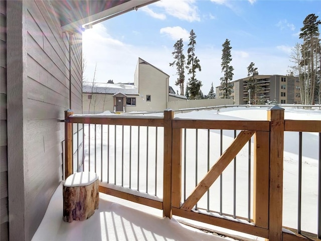 view of snow covered deck