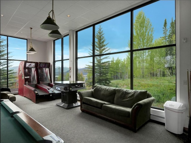 sunroom / solarium featuring a healthy amount of sunlight and pool table