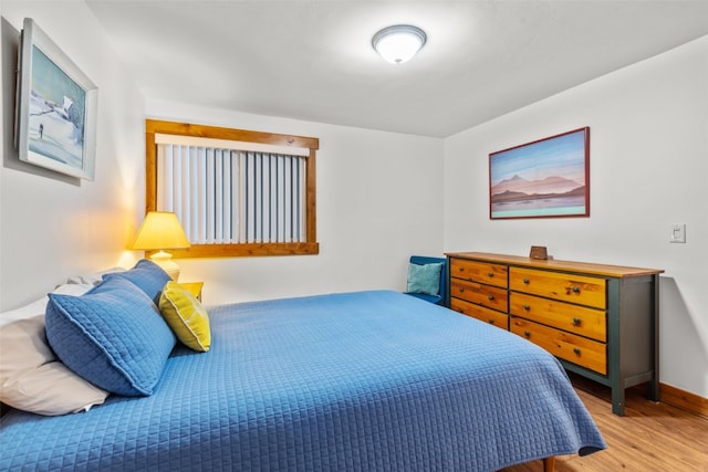 bedroom featuring light hardwood / wood-style floors