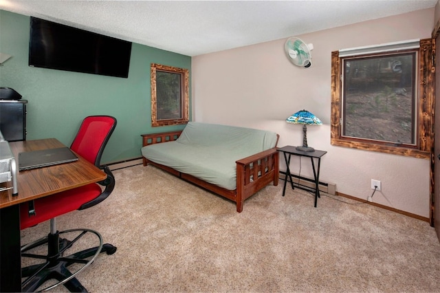 bedroom with a baseboard heating unit, baseboards, carpet, a textured ceiling, and a baseboard radiator