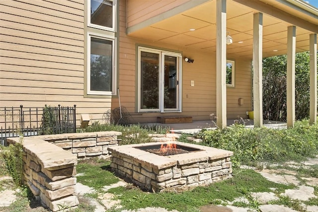 view of patio featuring a fire pit