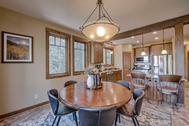 dining area featuring sink