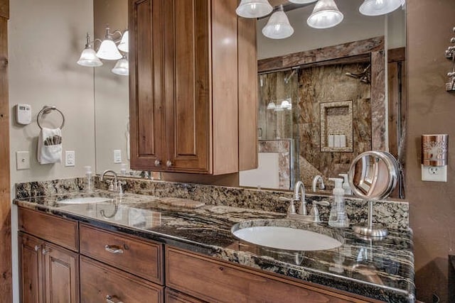 bathroom with vanity and an enclosed shower