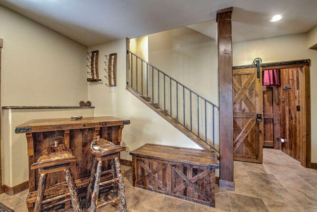 stairs with a barn door